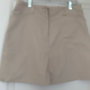 Beige Nike Golf Skort, 4 pockets, size 10